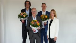 Die drei neuen Prokuristen mit SRH-Geschäftsführerin Daniela Enslein