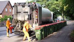 Die Müllabfuhr bei der Arbeit
